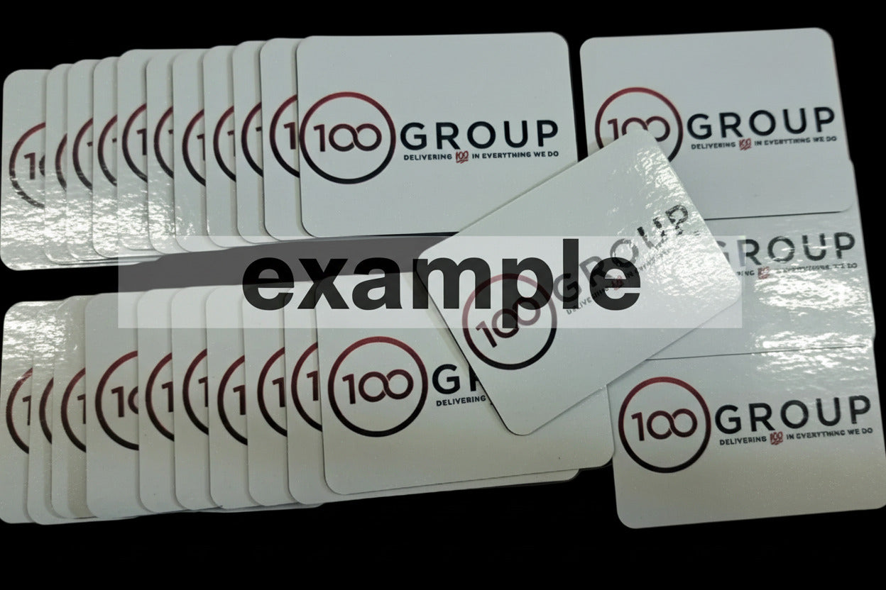 Multiple cards with '100 Group' branding on a black background